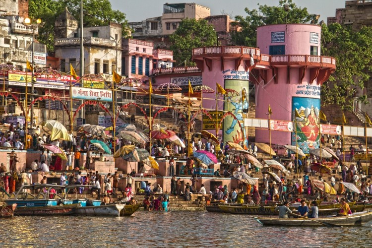 Pilgrims taking boat from ghats to cross Ganges in Varanasi Dashsaswamedh Ghat