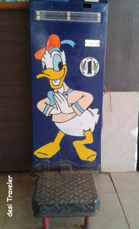 donald duck coin operated weighing machine