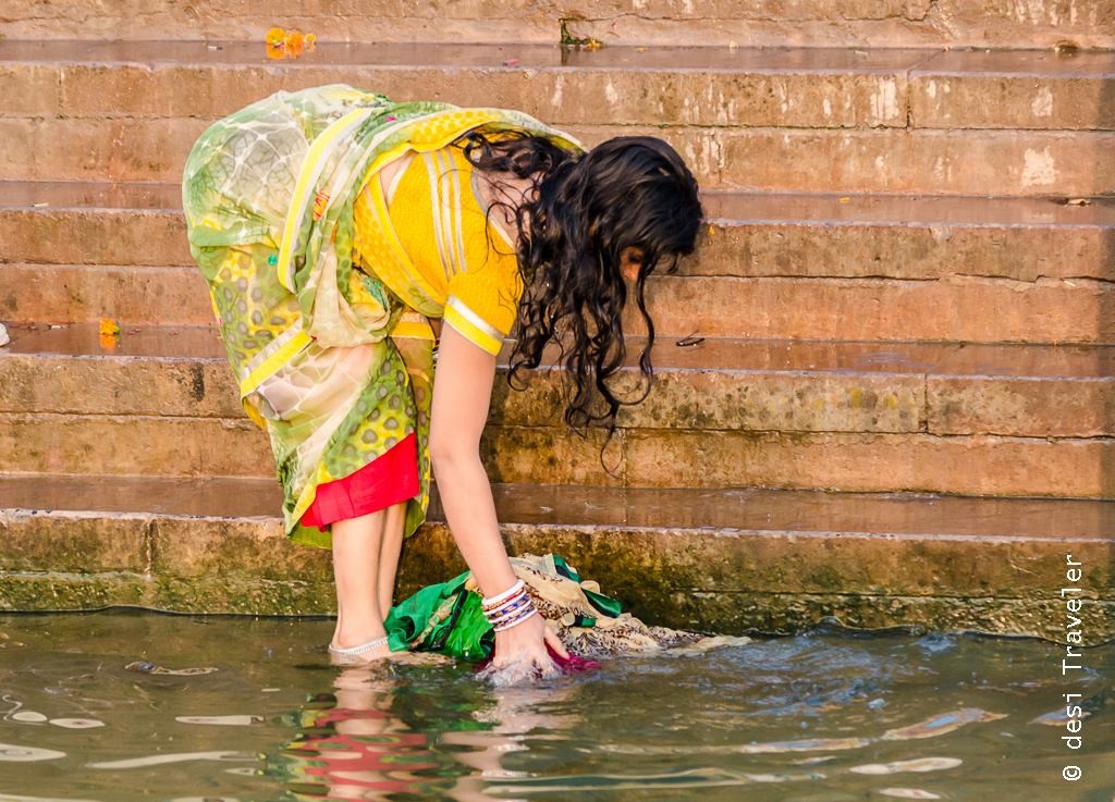 women Varanasi ghat washing 