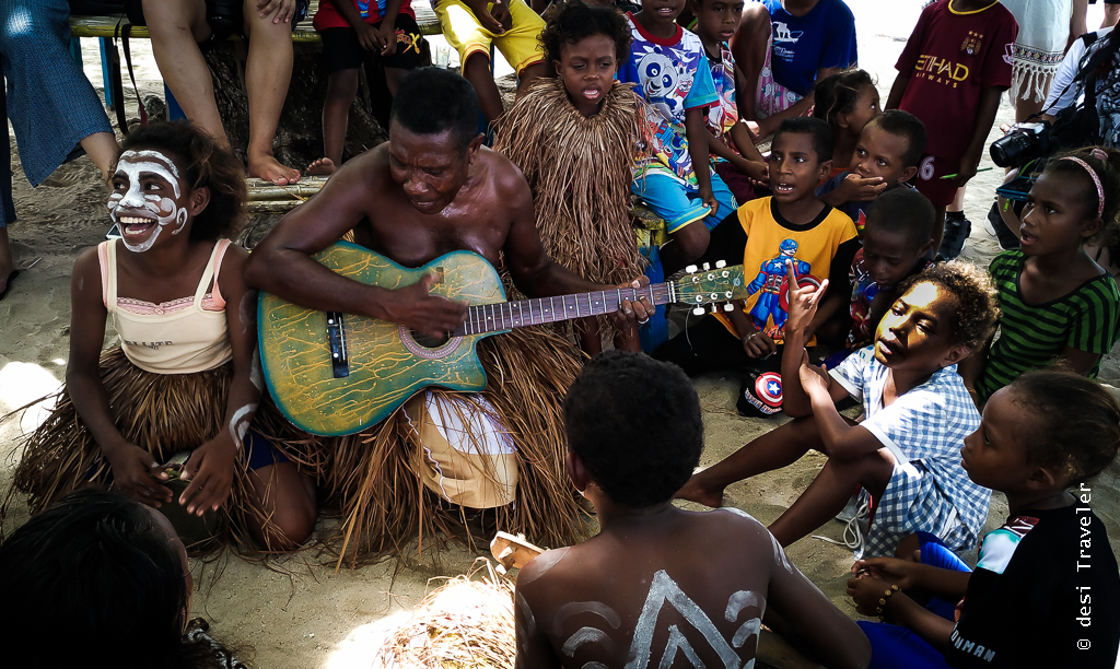 Papua tribal sing welcome songs Arborek tourism village Indonesia