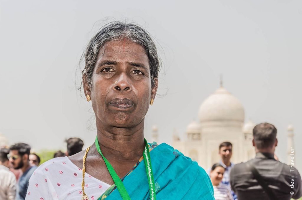 Old woman in front of Taj Mahal Agra