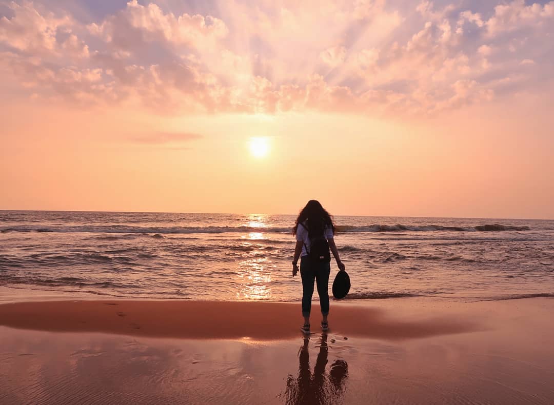 Girl watching Sunset Veli Beach Trivandrum 
