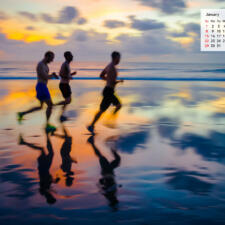 January 2017 Desktop Calendar - Runners on a beach in Bali Indonesia